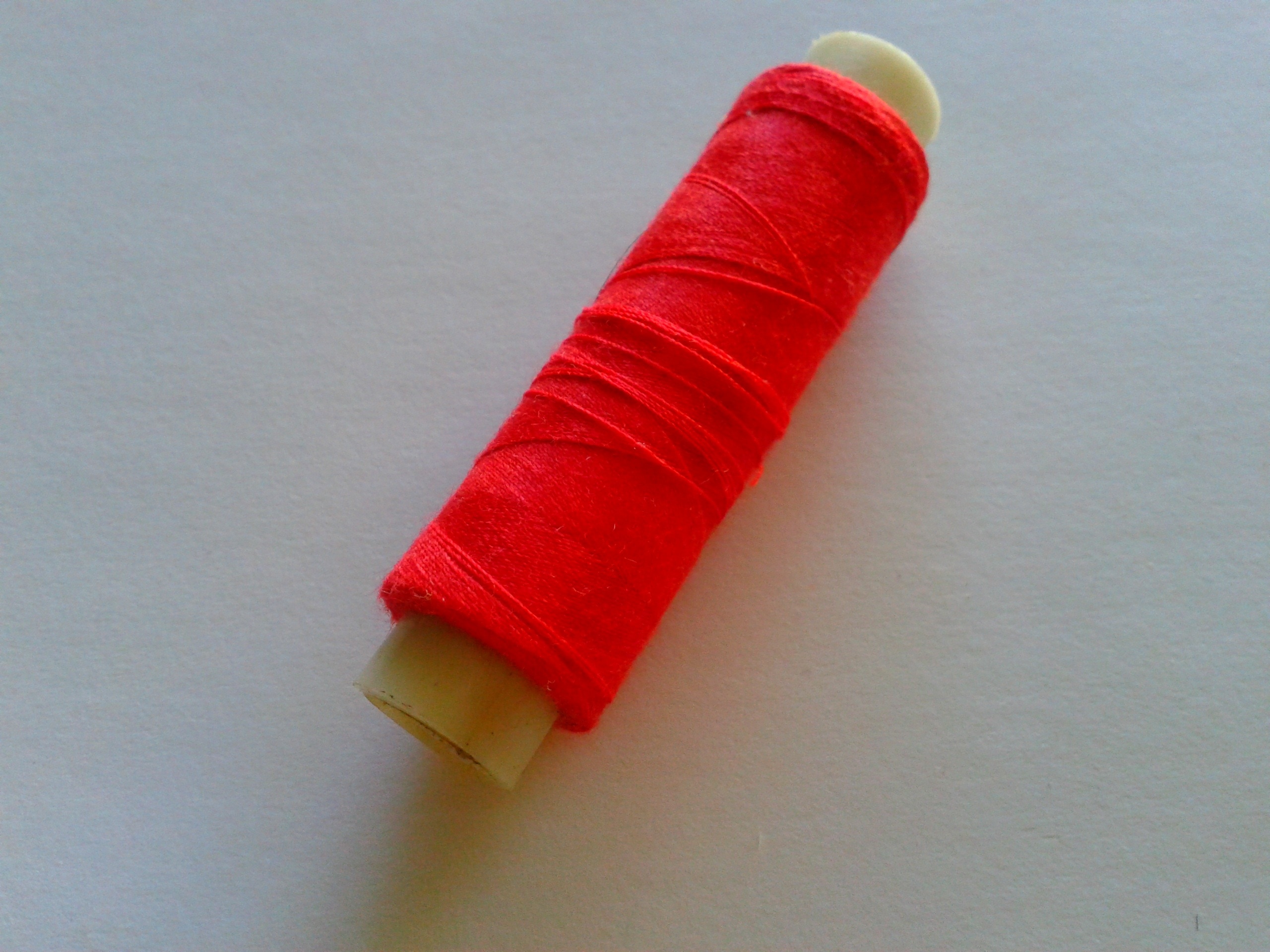 red sewing thread