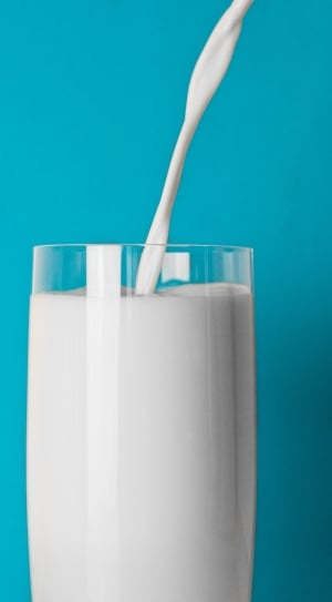 milk in clear drinking glass thumbnail