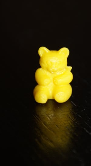 yellow bear figurine thumbnail