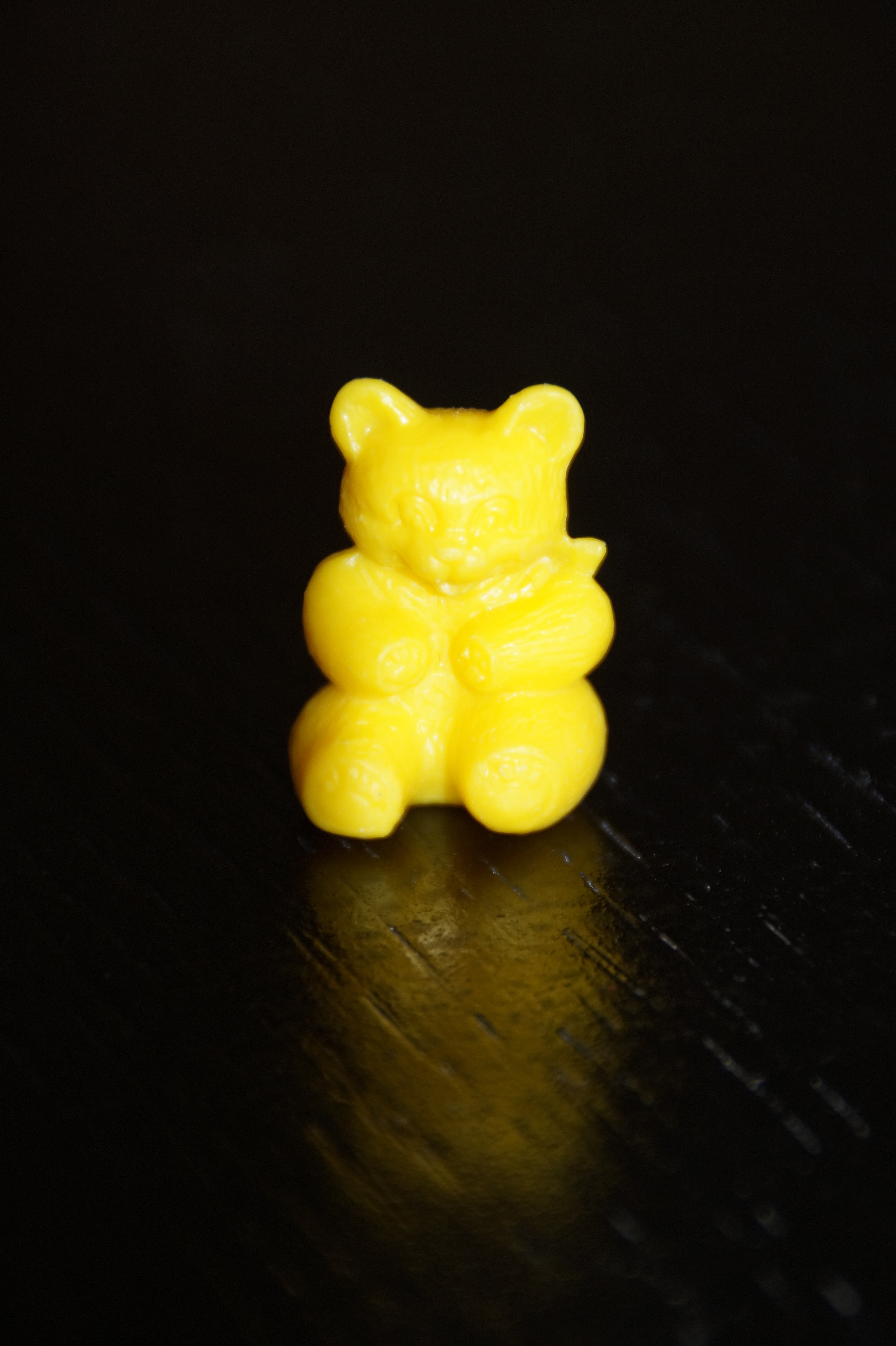 yellow bear figurine
