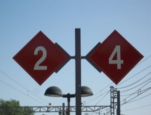 red and white 2 and 4 road signs thumbnail