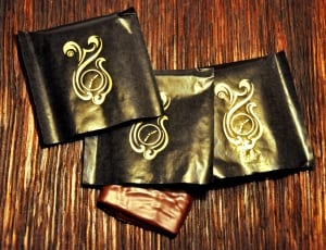 three black printed pouches thumbnail
