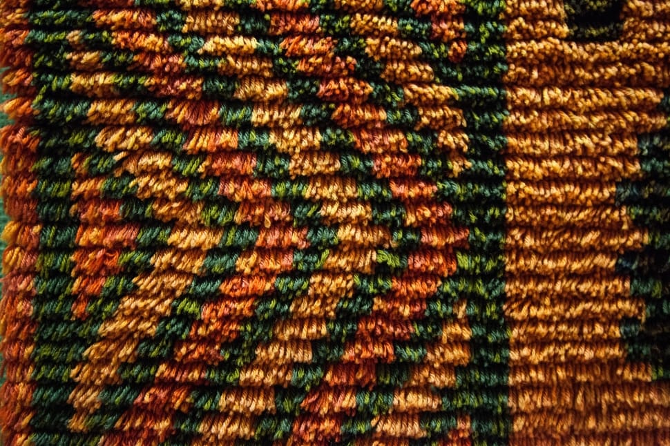 brown and green fur textile preview