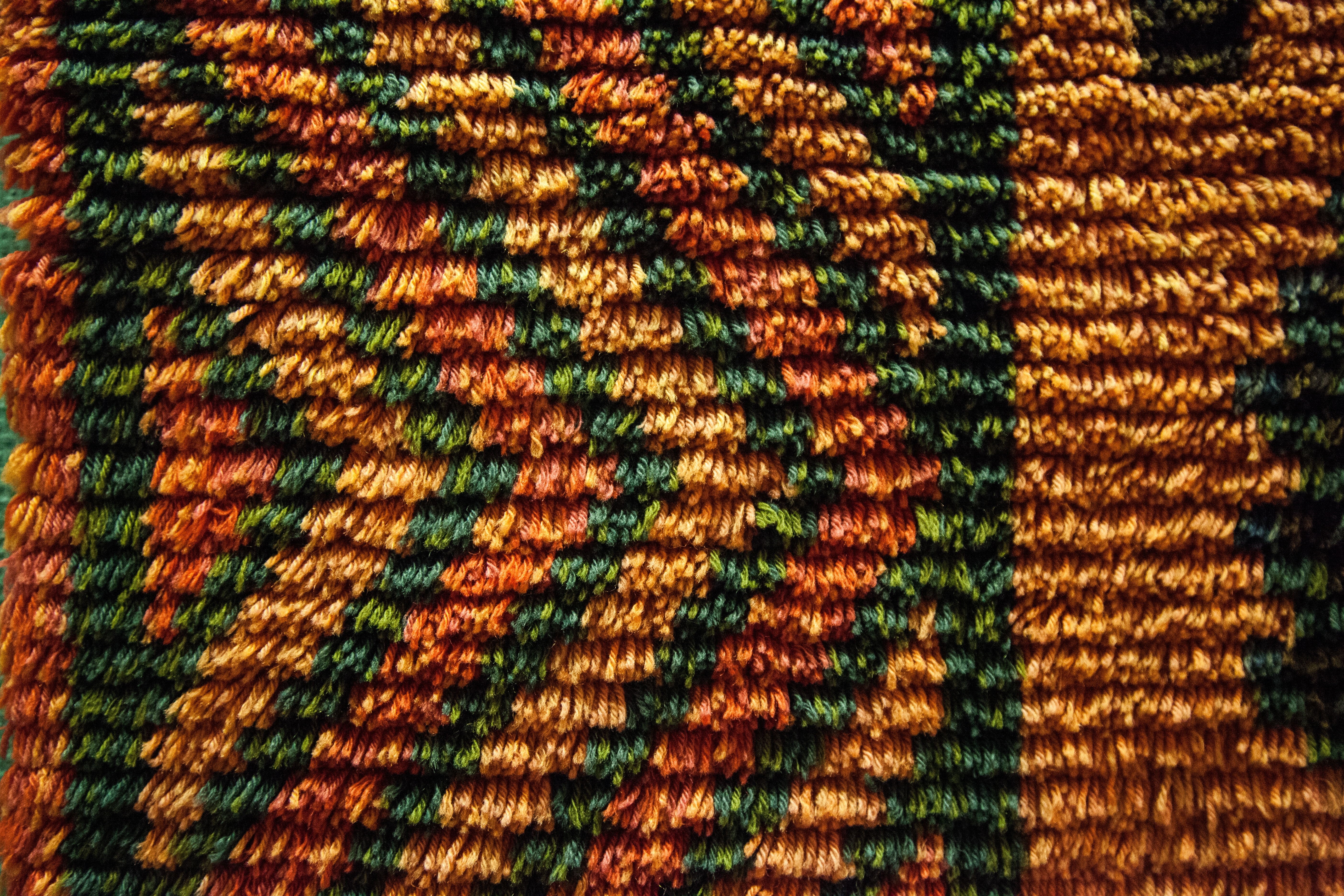 brown and green fur textile