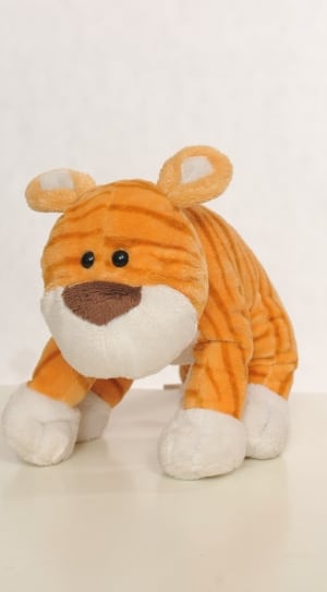 orange and white tiger plush toy thumbnail