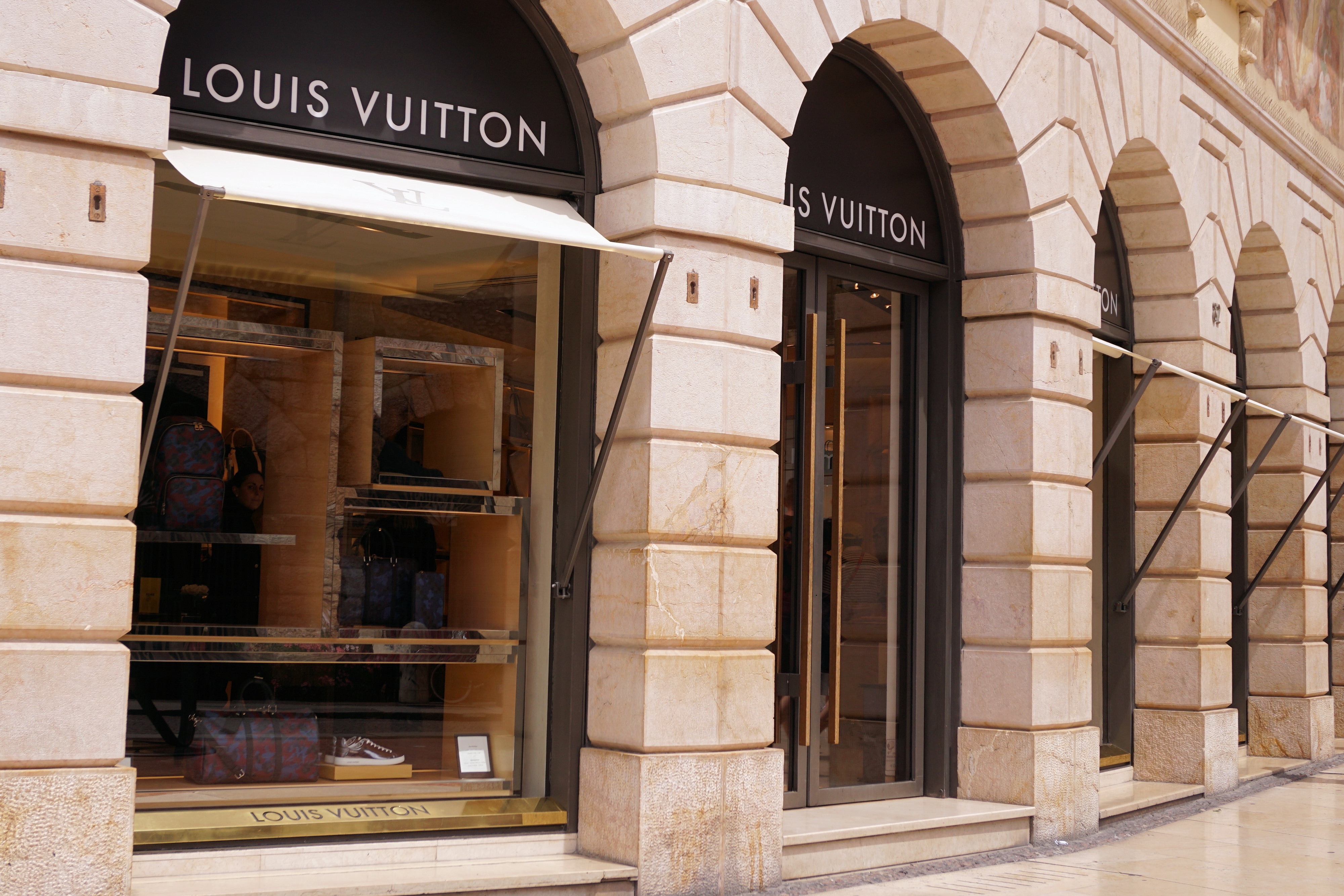 Window Of Louis Vuitton Boutique In Milan Stock Photo - Download