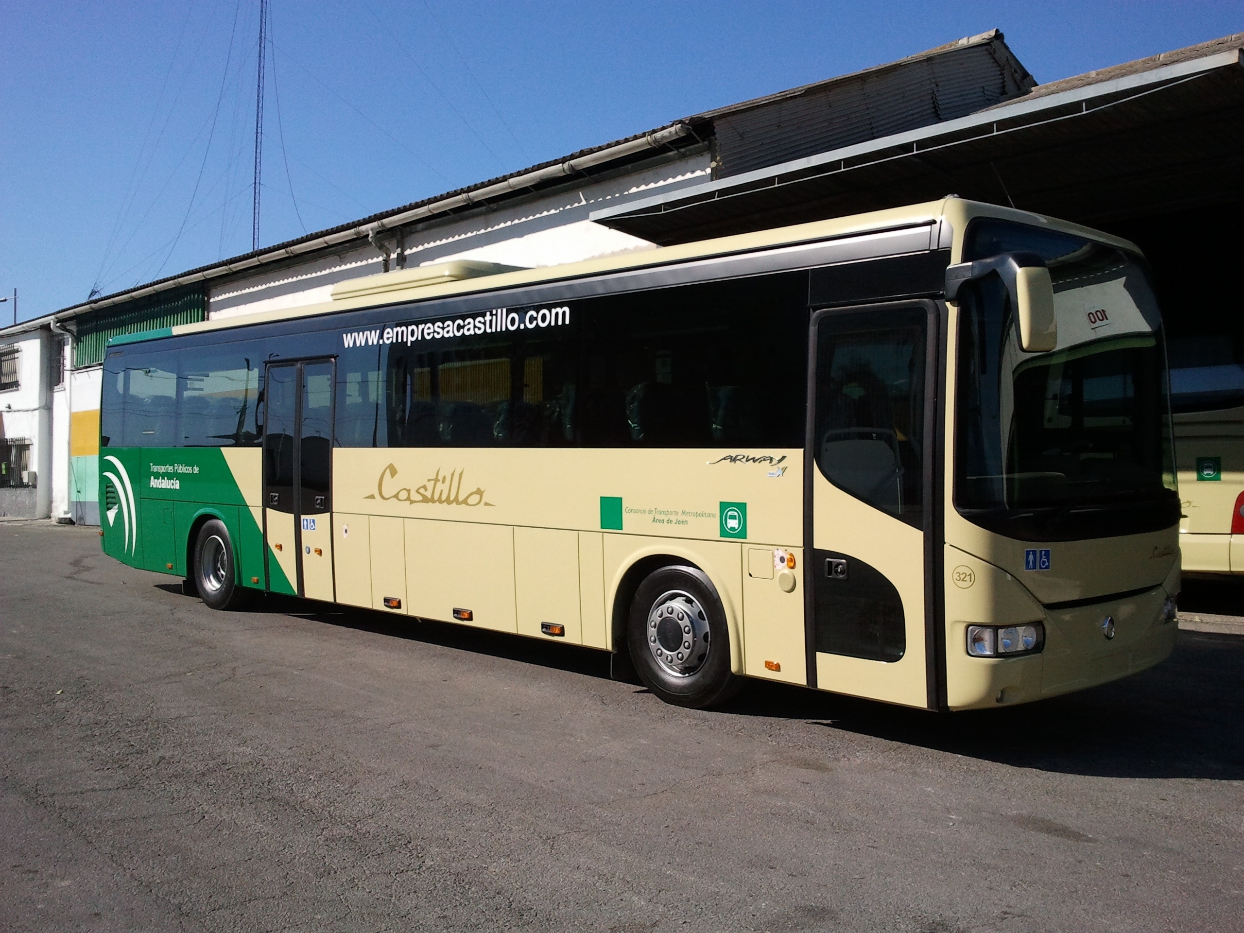 beige and green castillo bus
