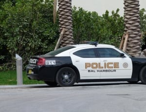 black and white police bal harbour dodge charger thumbnail