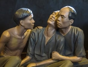 ceramic figurine of 3 men thumbnail