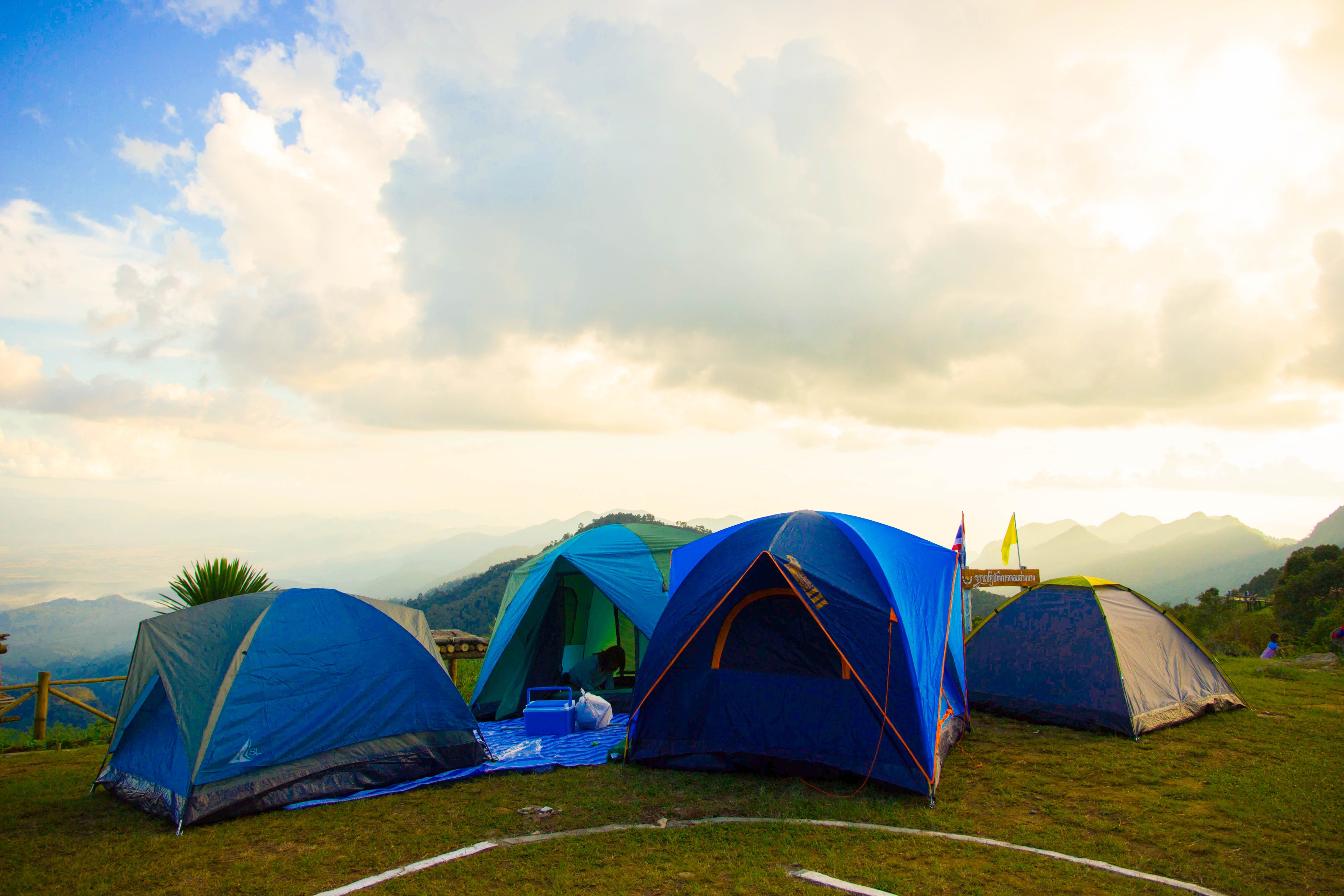 four blue dome tents