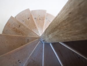 brown wooden spiral stairway thumbnail