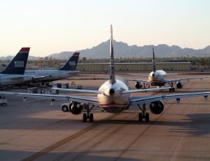 4 airplanes on airport thumbnail