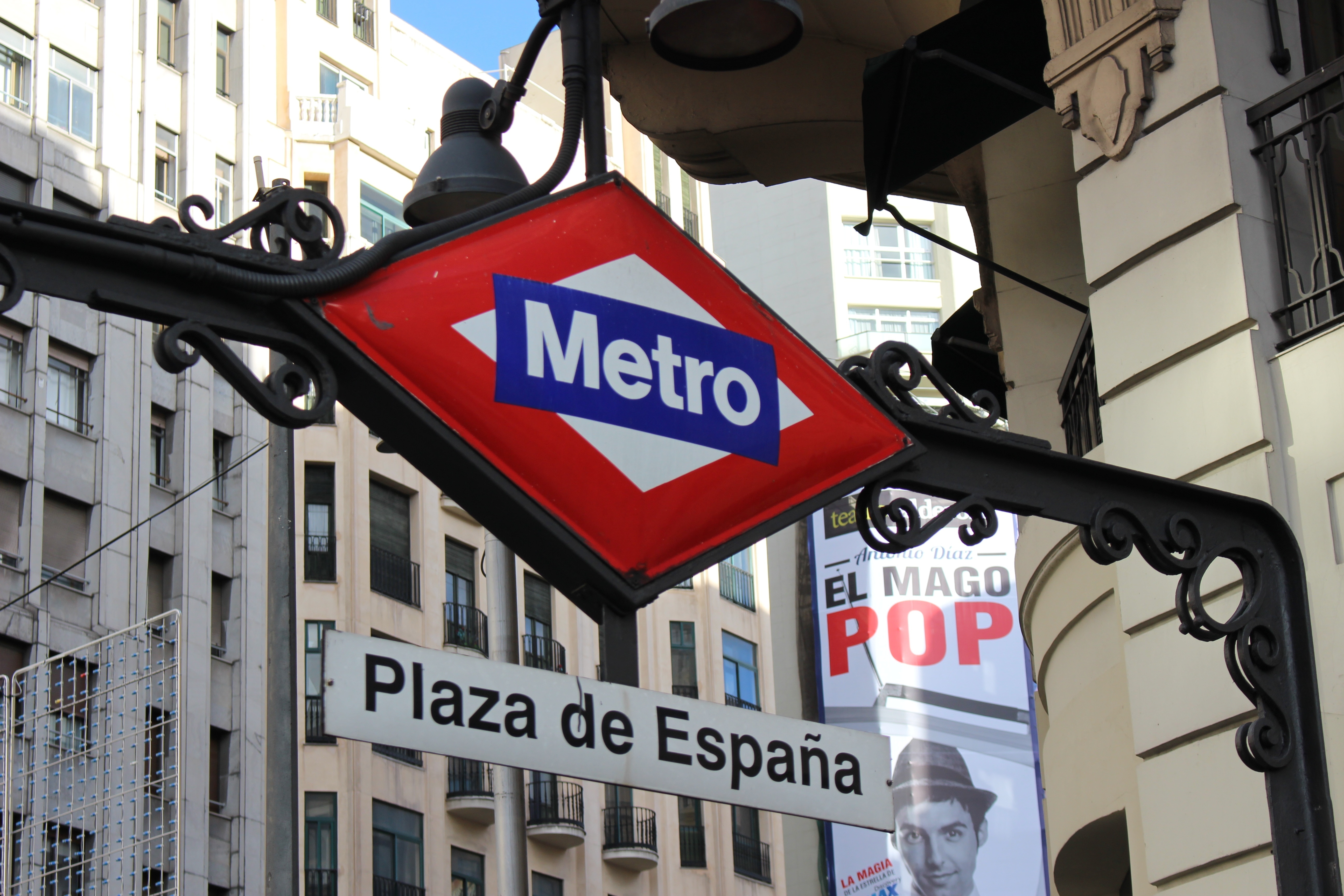 gray red white and blue metro print sign