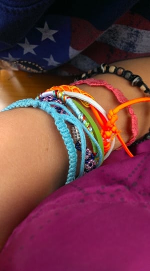 assorted braided friendship bracelets thumbnail