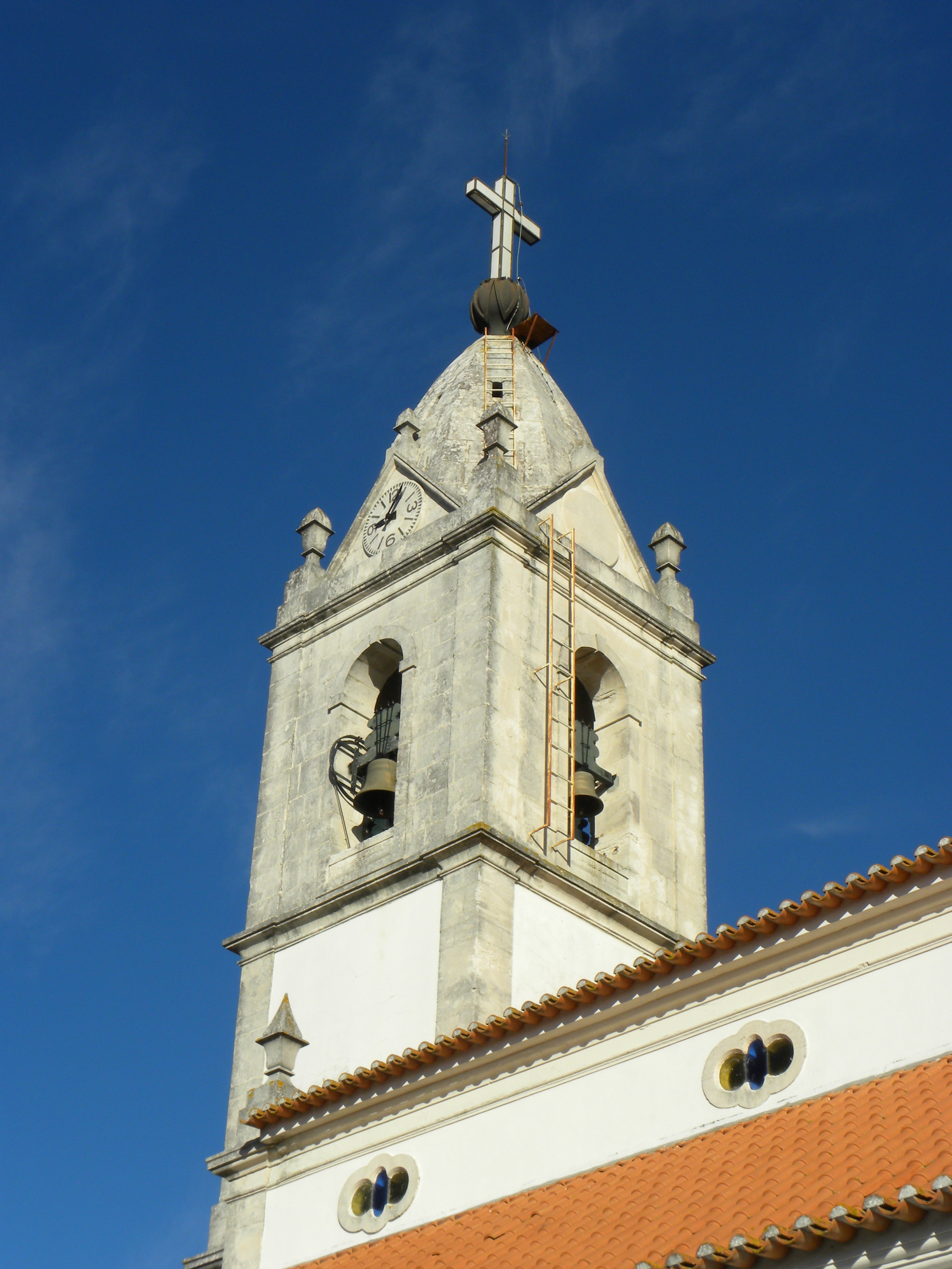 white gray and orange cathedral bell tower