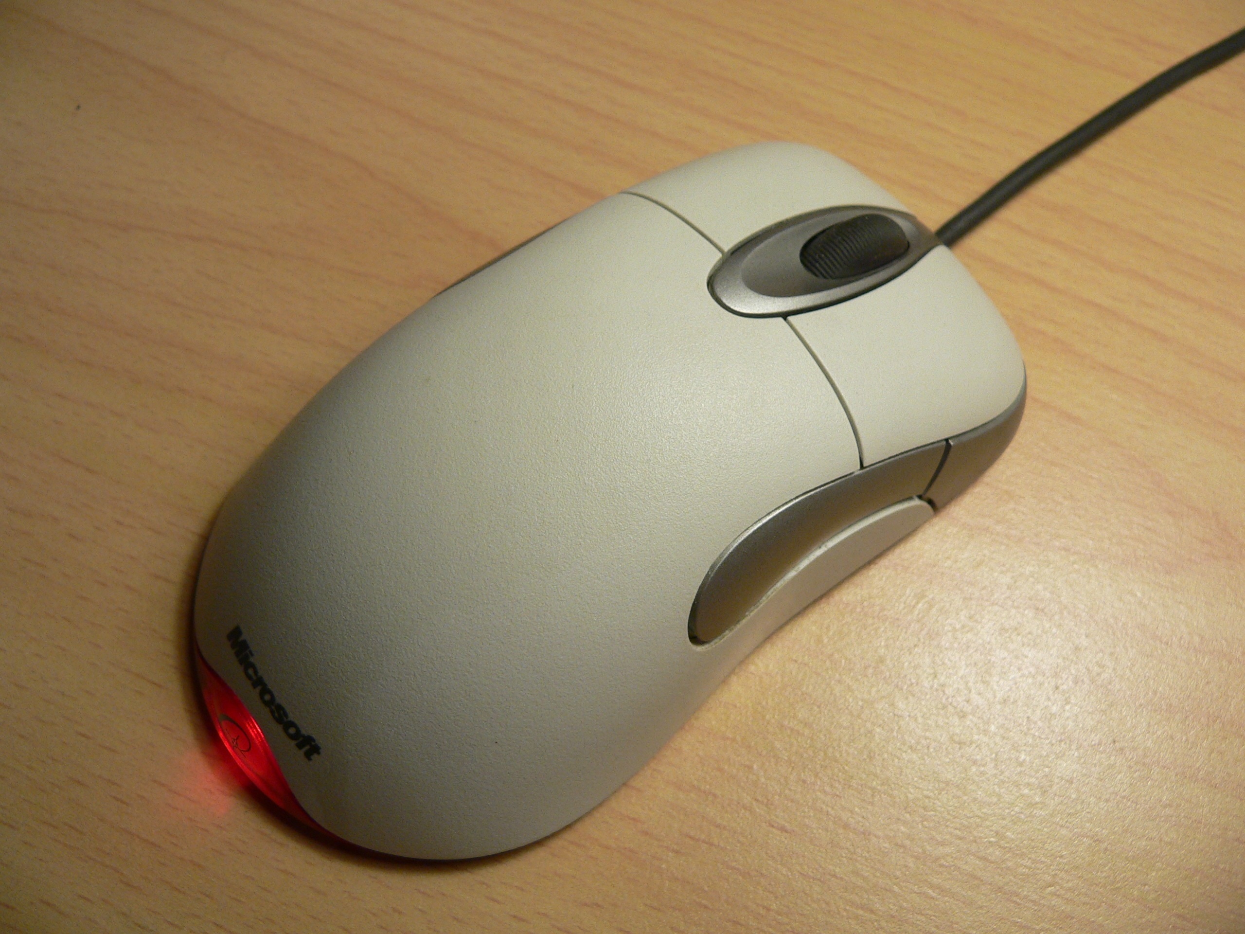 white and gray microsoft mouse