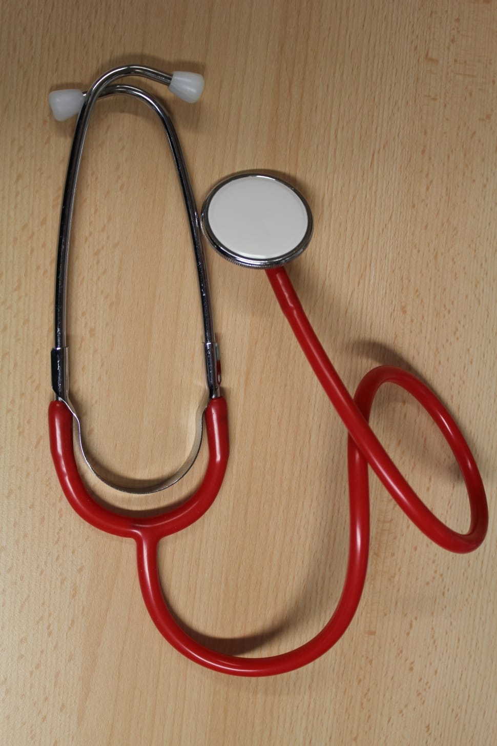 red and stainless steel stethoscope preview