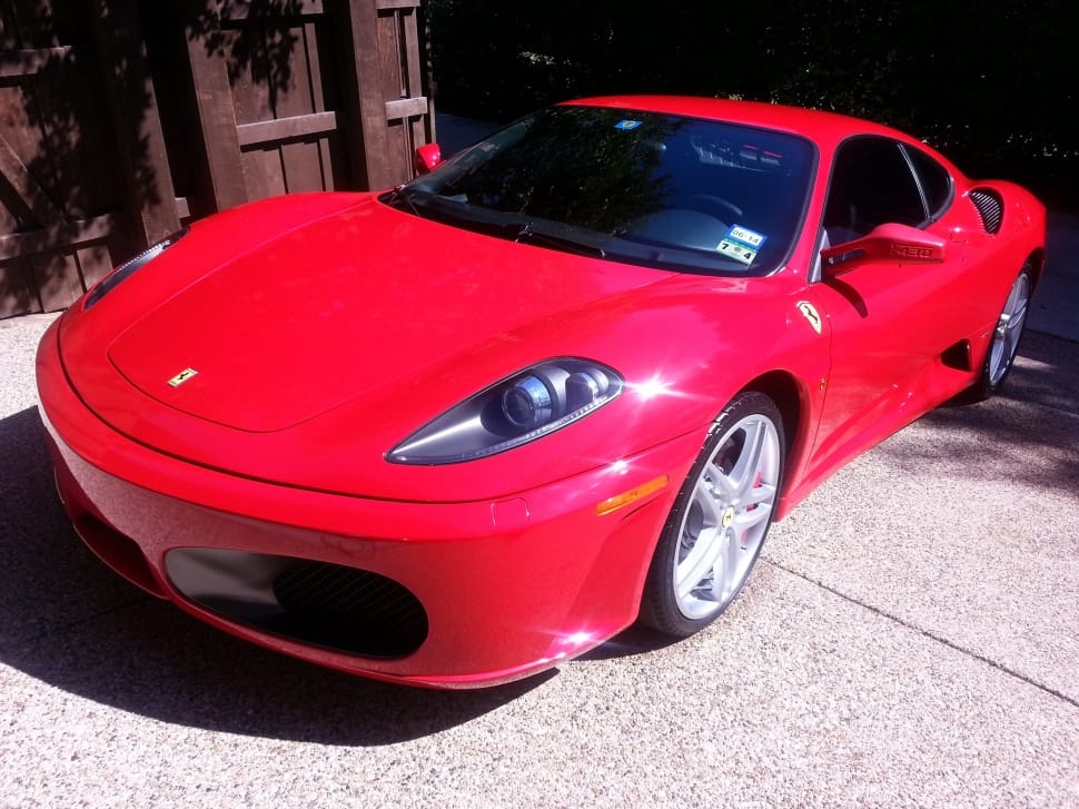 red ferrari sports coupe preview