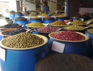 assorted color beans in blue containers thumbnail
