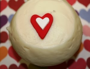 round cupcake with heart icing on top thumbnail