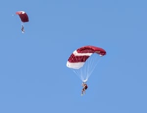 white and red paragliding thumbnail