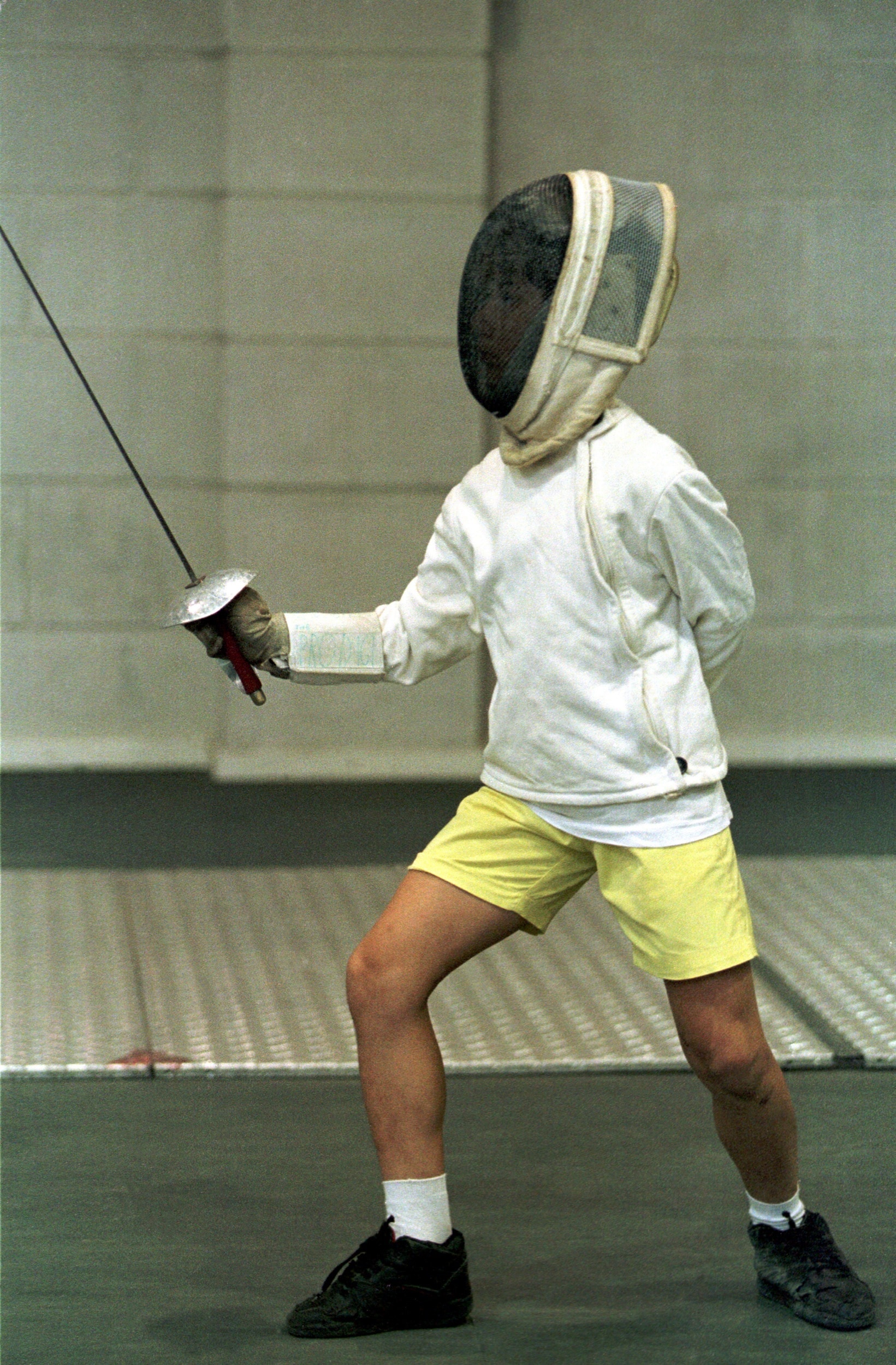 white fencing suit