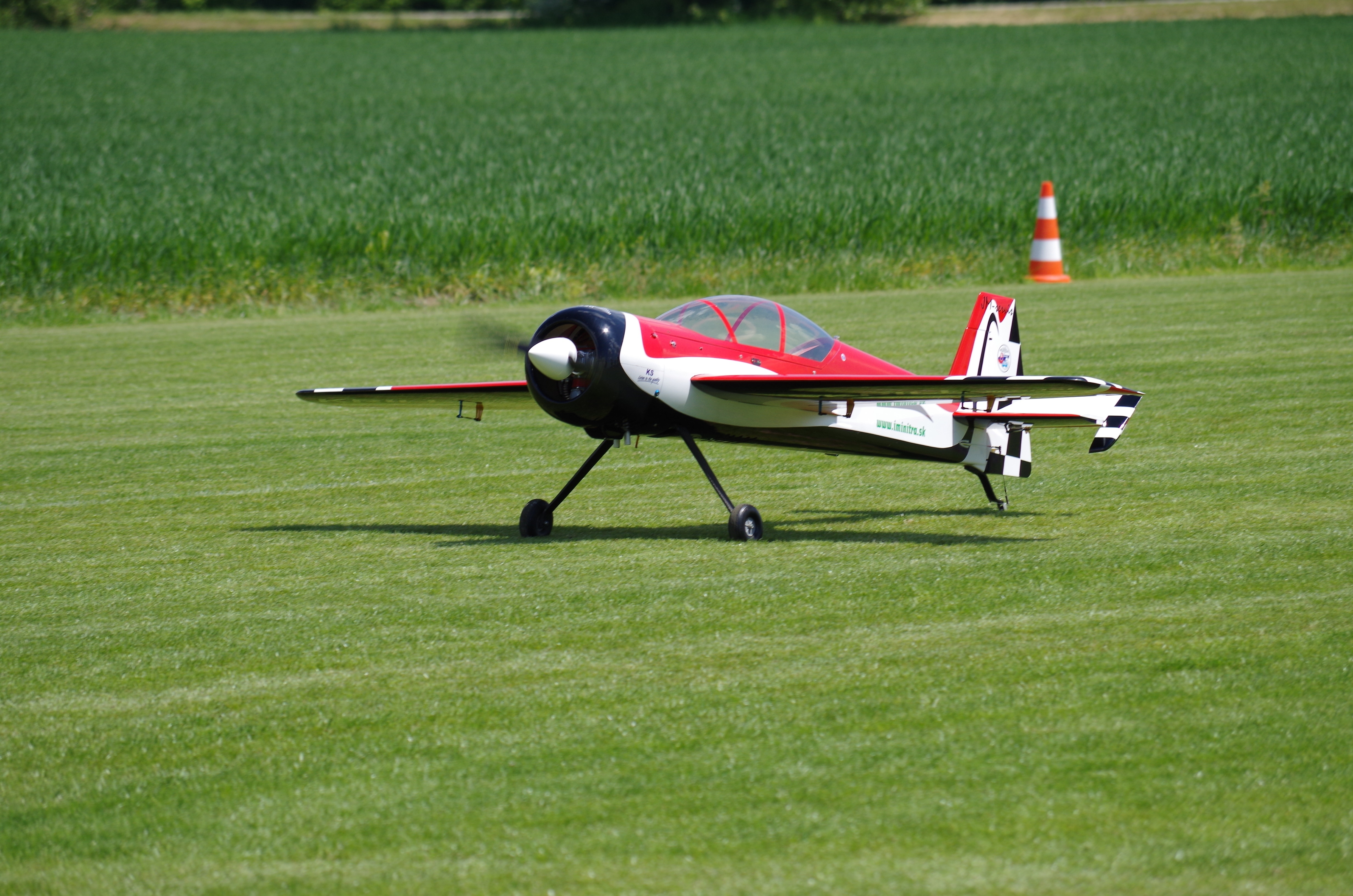 red and white biplane