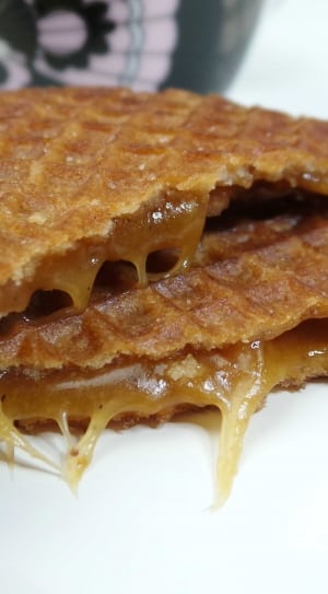 syrup filled waffle on white surface thumbnail