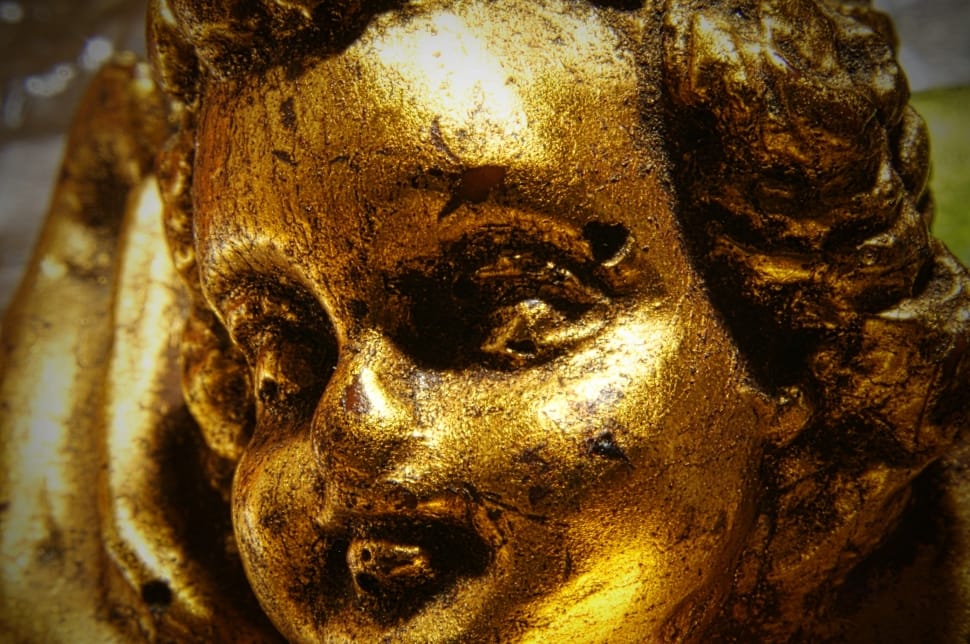 gold cherub figurine preview