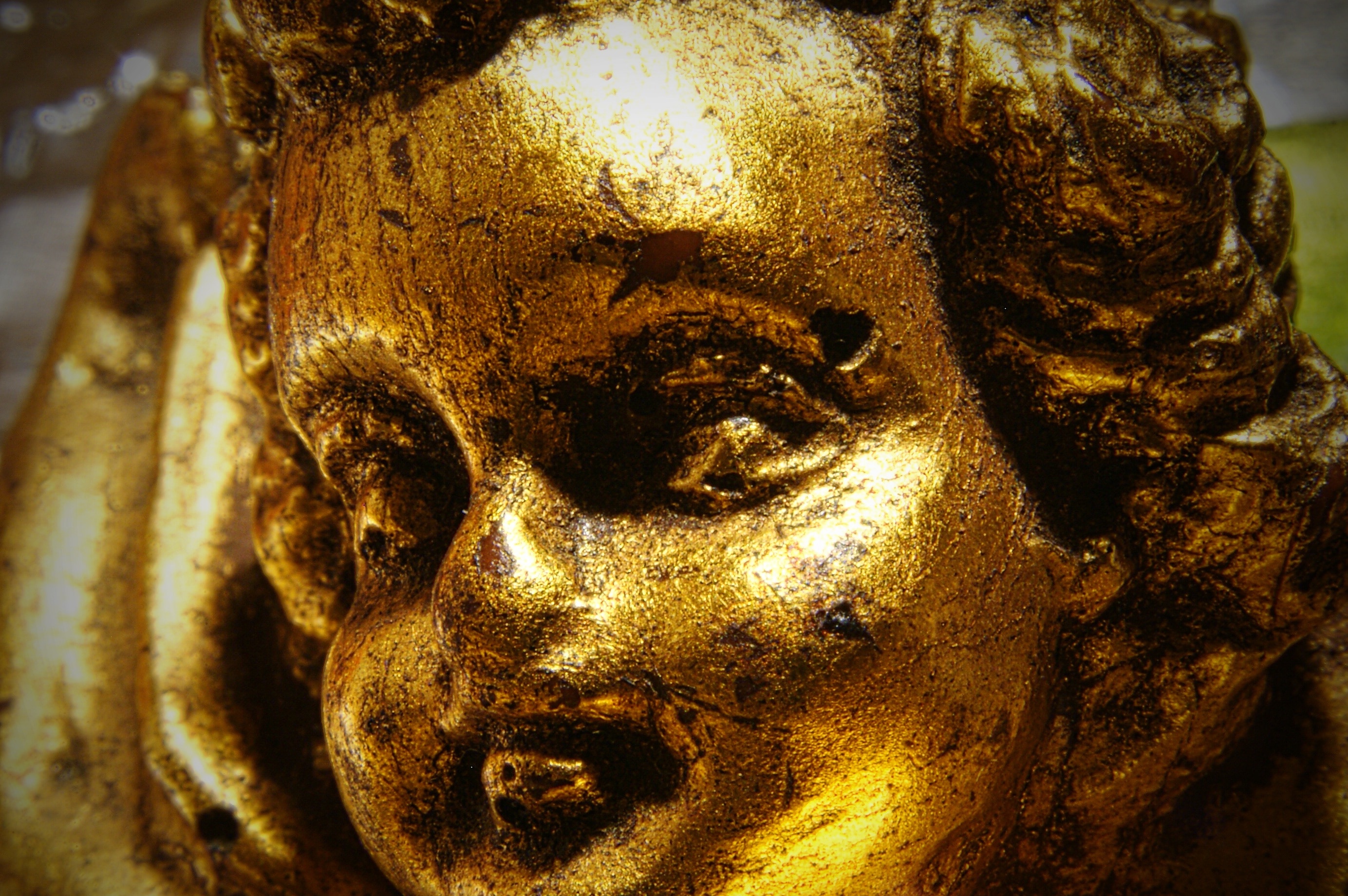 gold cherub figurine
