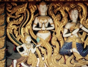 beige and brass buddha decor thumbnail