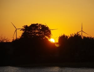 silhouette of wind turbines thumbnail