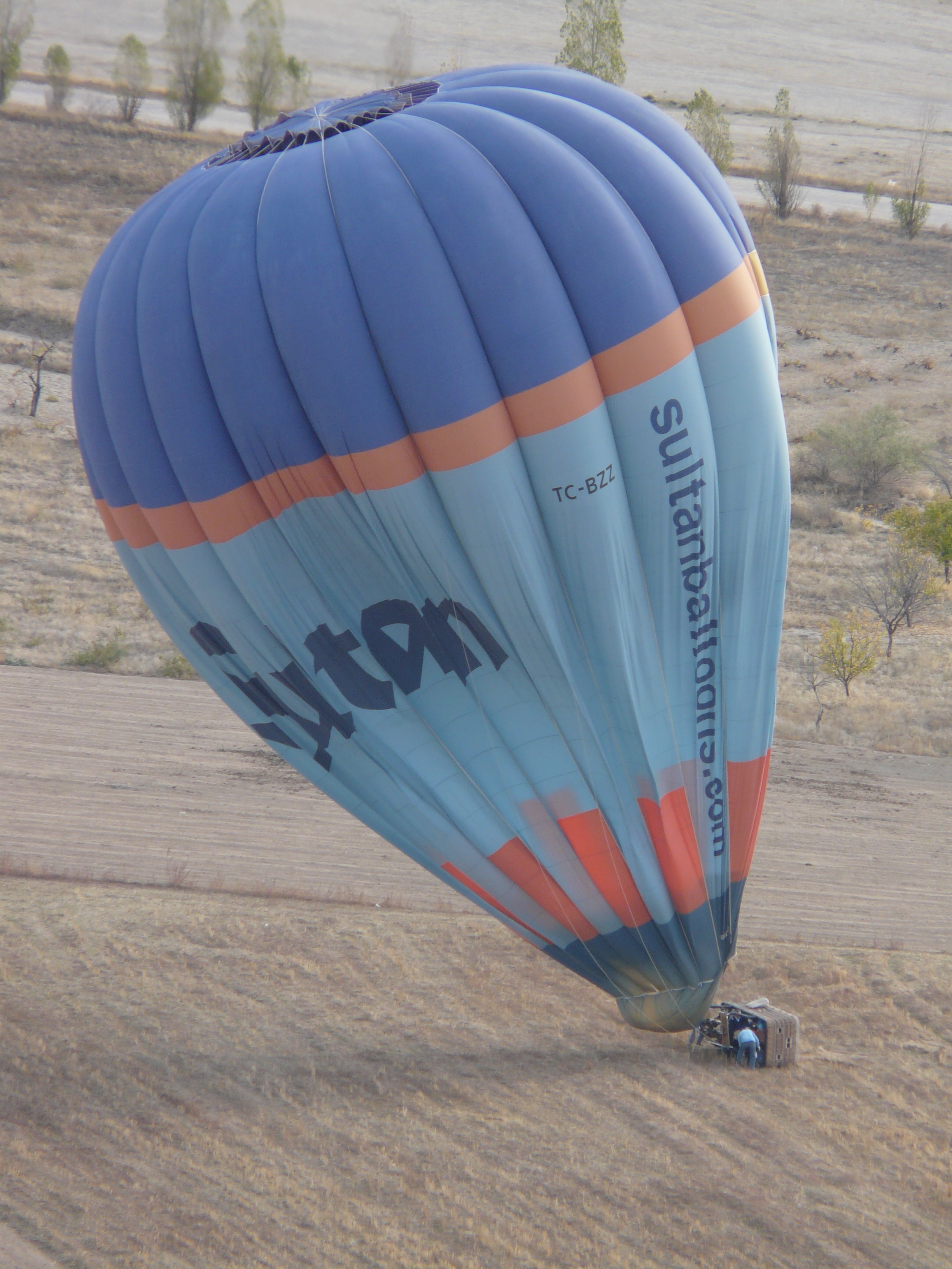 blue teal orange and red hot air balloon