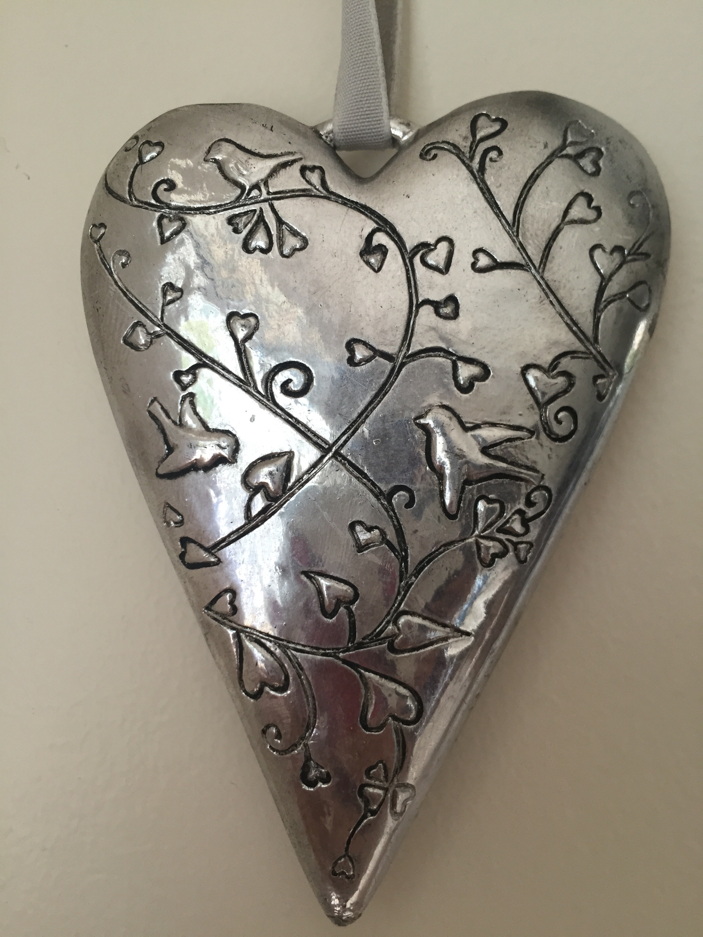 silver birds on trees with heart leaves engraved heart pendant