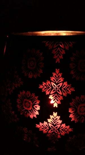 shallow focus photography of red and black shadow candle lantern thumbnail