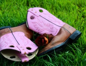 pair of pink and brown cowboy boots thumbnail