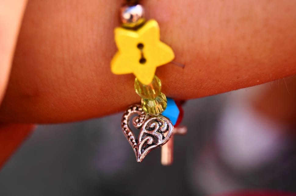 silver heart and yellow star bracelet preview