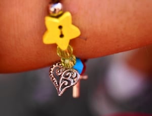 silver heart and yellow star bracelet thumbnail