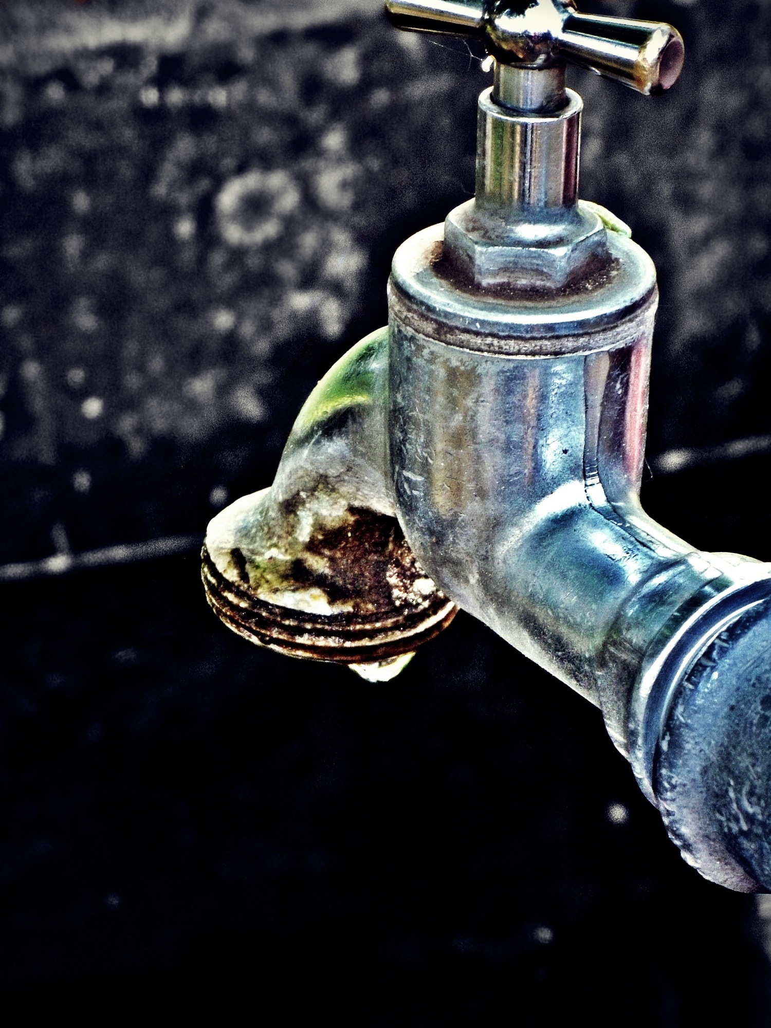 grey metal faucet