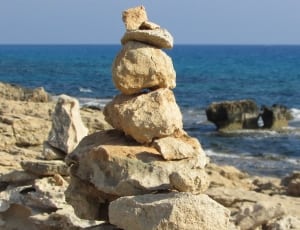 rock formation beside sea thumbnail