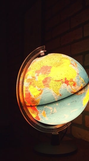 blue and yellow desk globe with light thumbnail