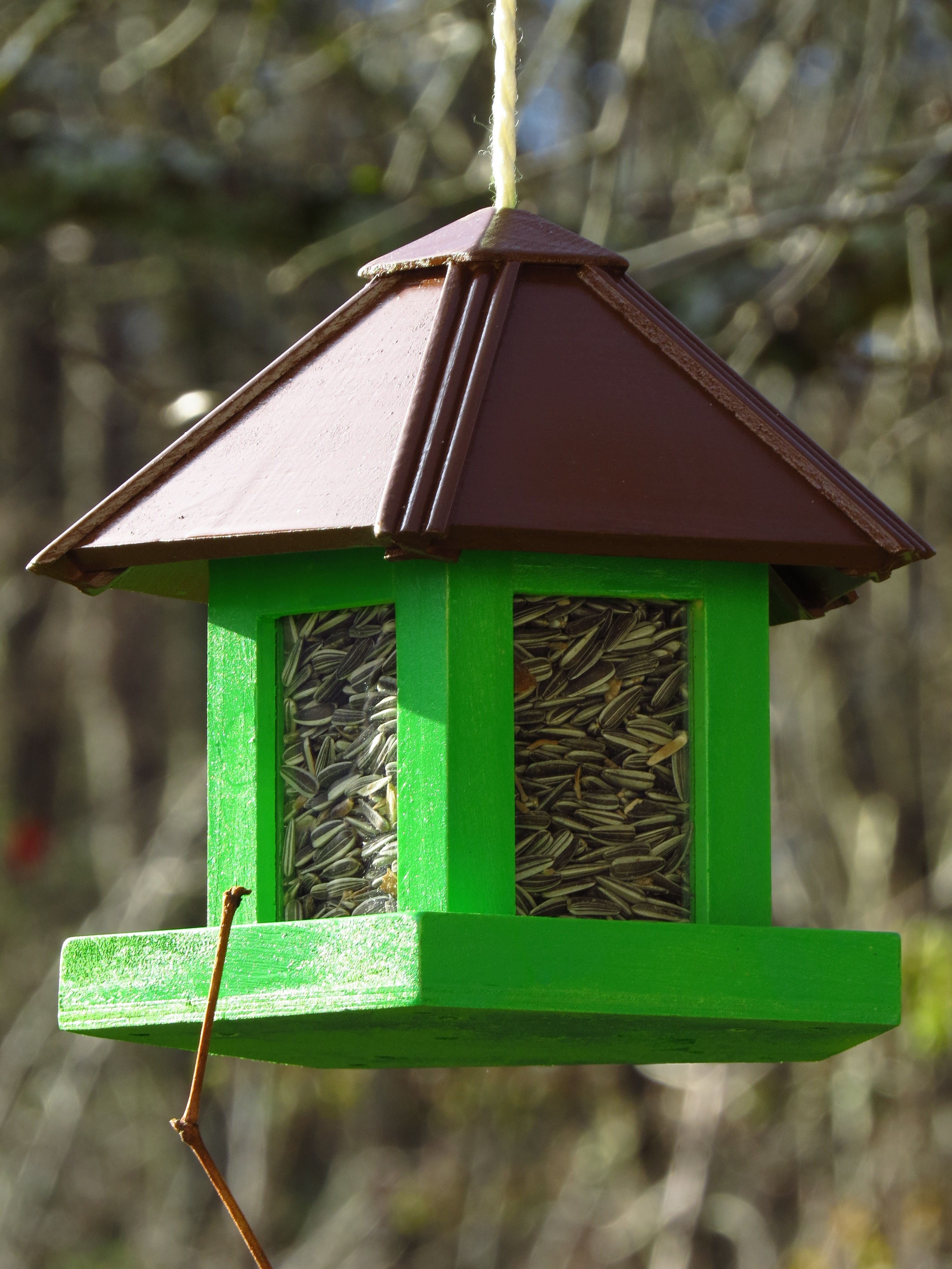 green and brown bird house