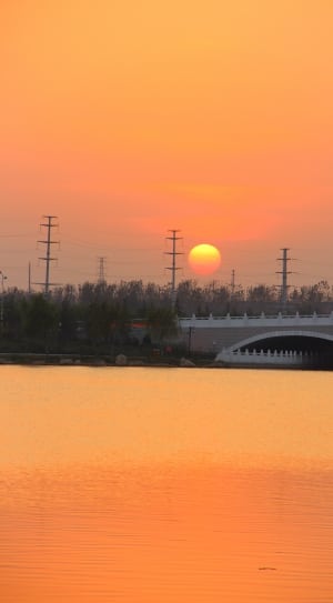 white and brown concrete bridge in sunset thumbnail