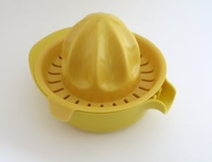yellow plastic citrus juicer thumbnail