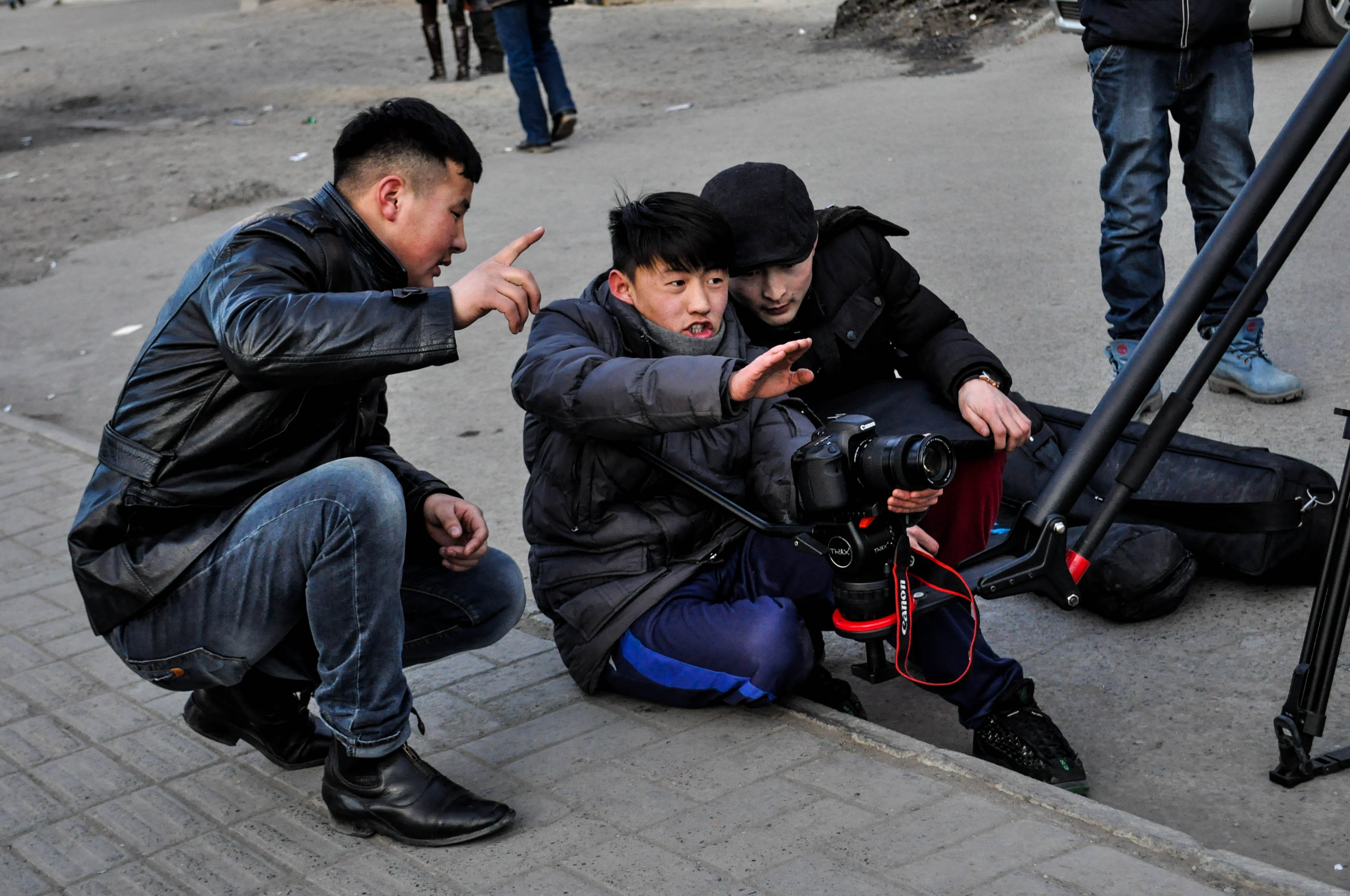 photography of group of people shooting scene