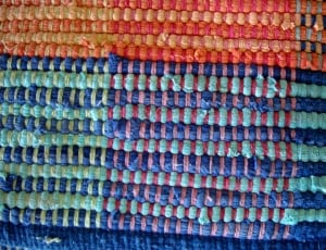 teal, blue and orange knitted textile thumbnail
