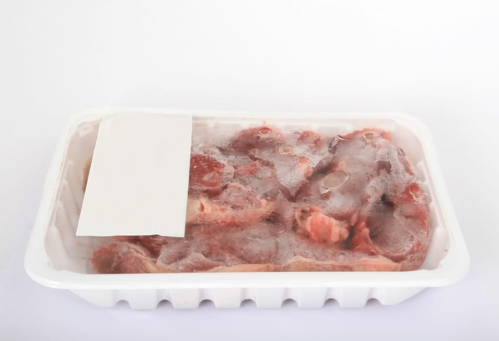 raw meat on white plastic container preview