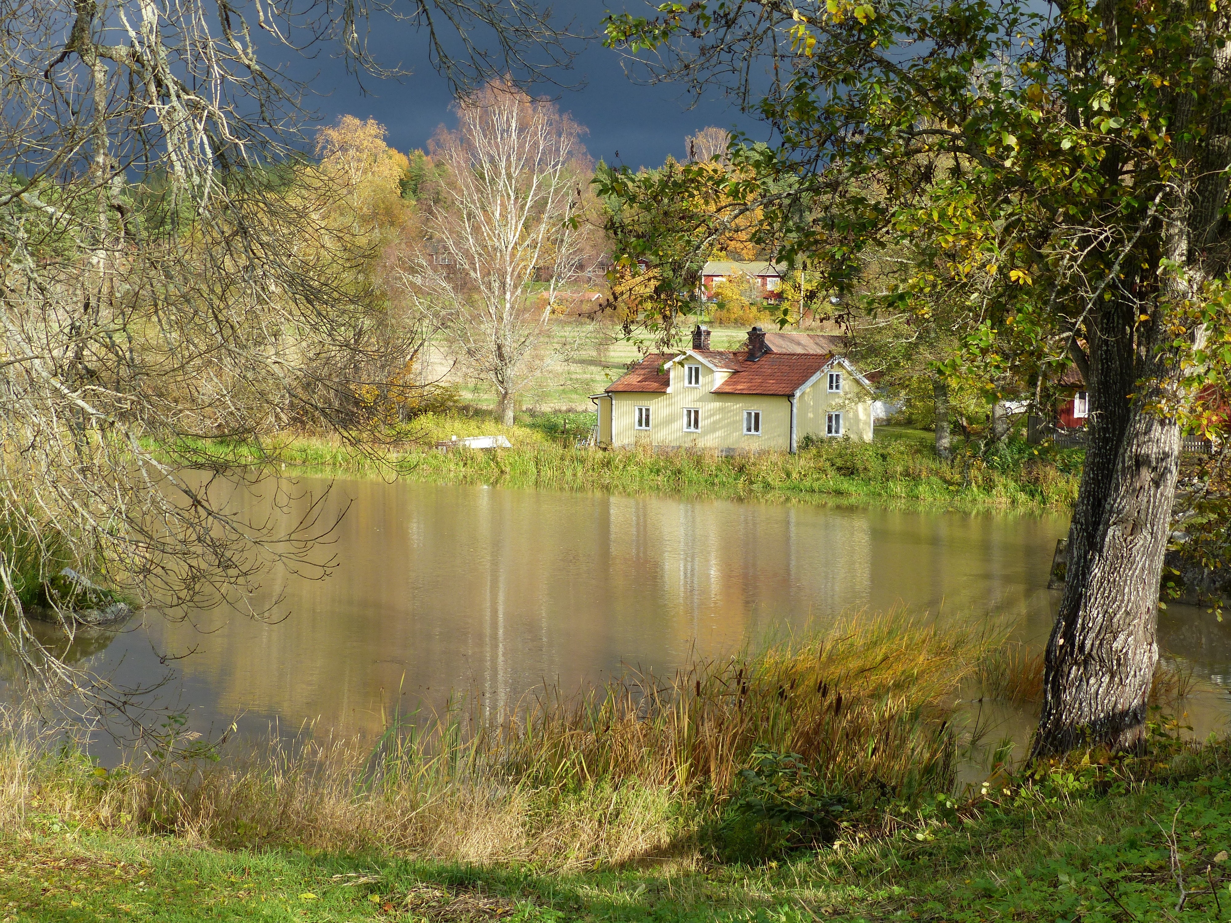 beige house near lake