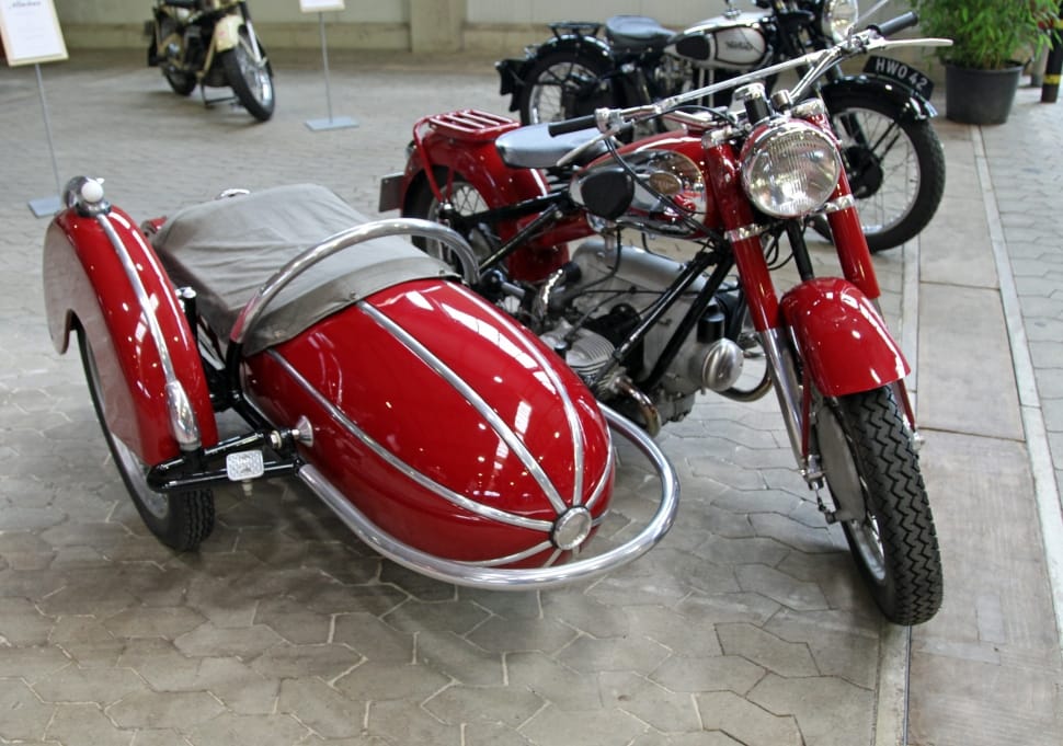 red standard motorcycle with sidecar preview