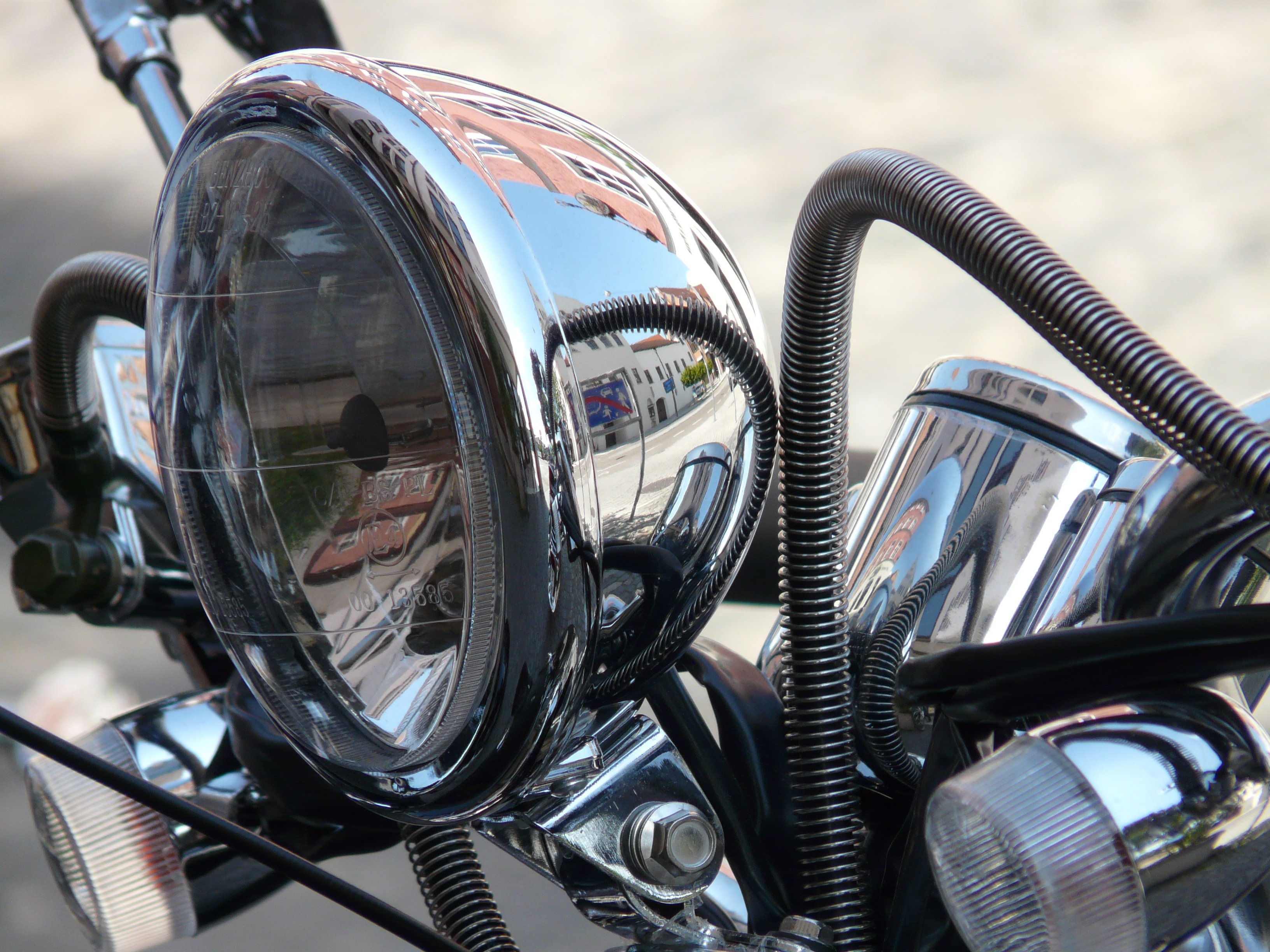 silver motorcycle headlight